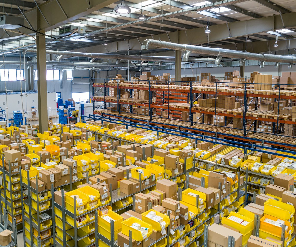Professional China sourcing agent inspecting a factory production line